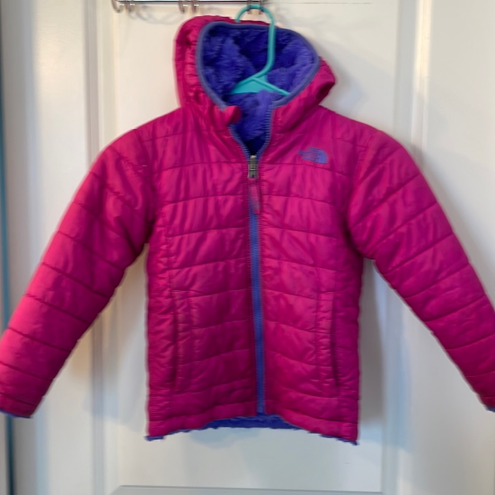 The North Face reversible fleece lined jacket in pink and purple.